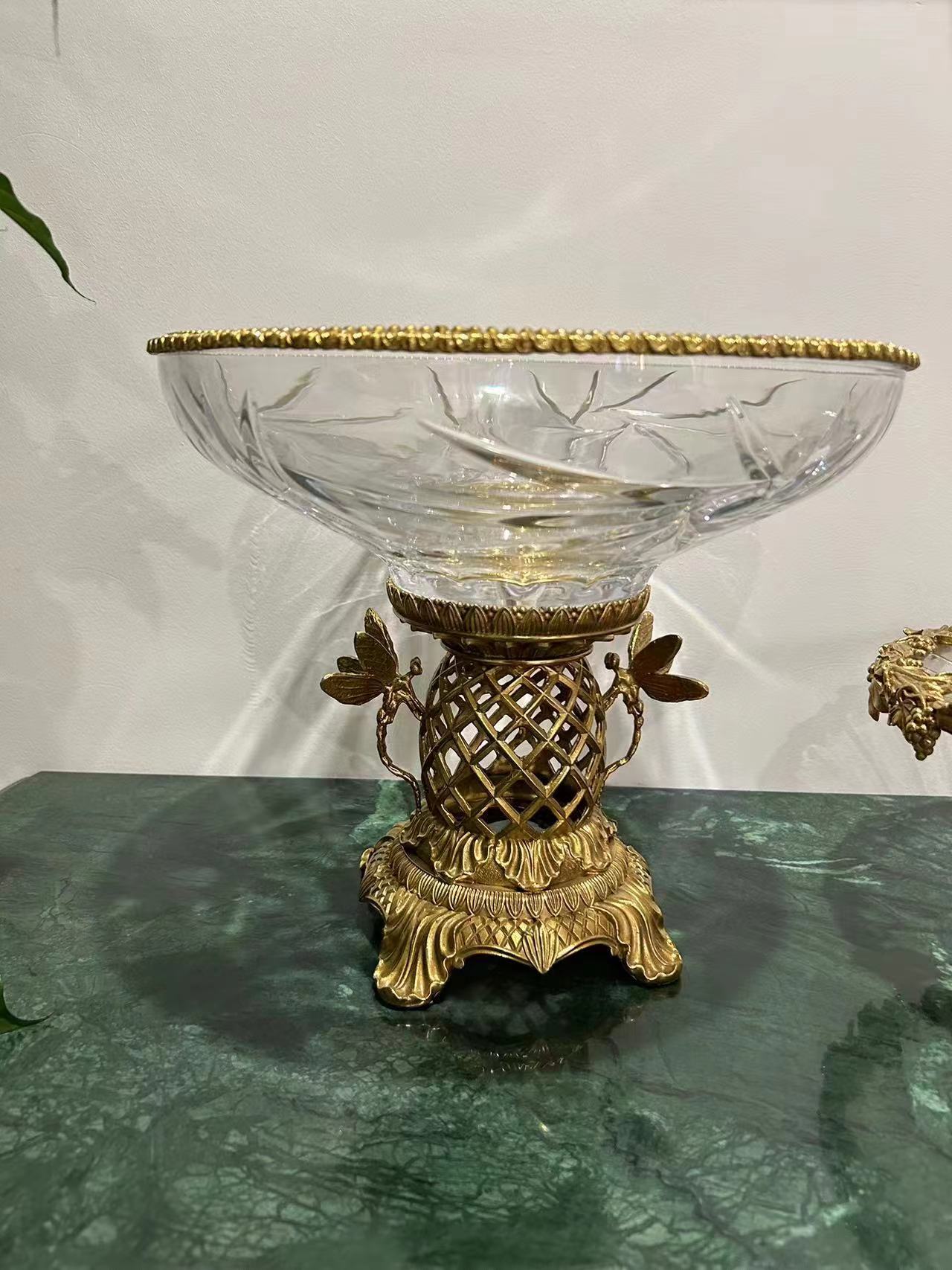 elegant glass bowl on ornate gold base