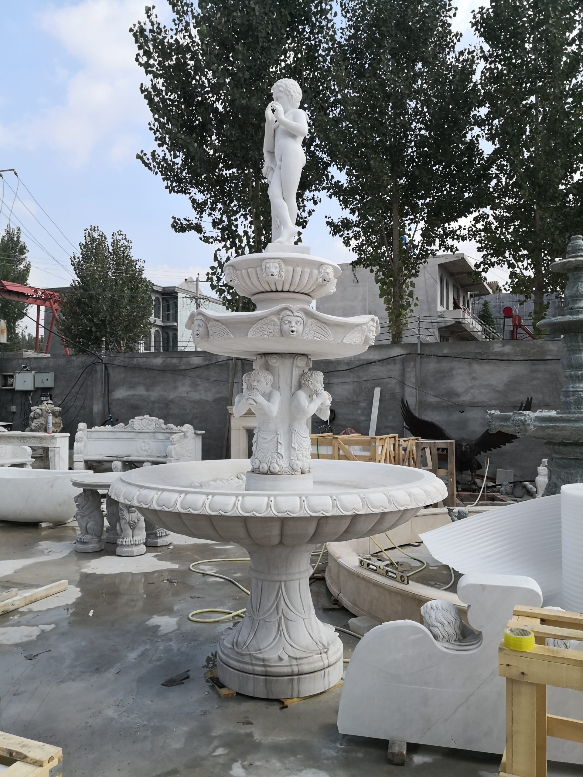 Elegance in Motion: Serene Fountain Sculpture