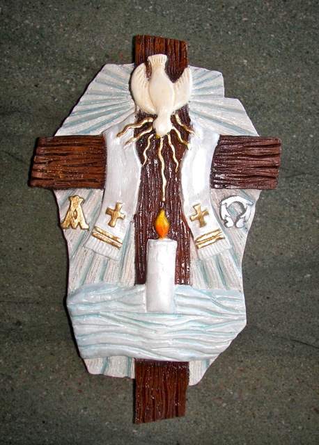 decorative wall cross with dove and candle details