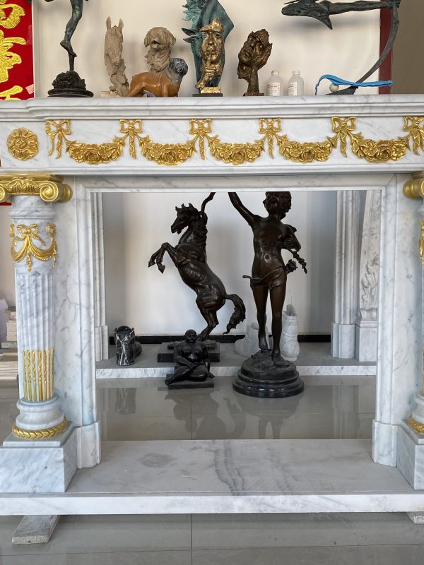 Elegance Unveiled: Exquisite Fireplace Sculpture