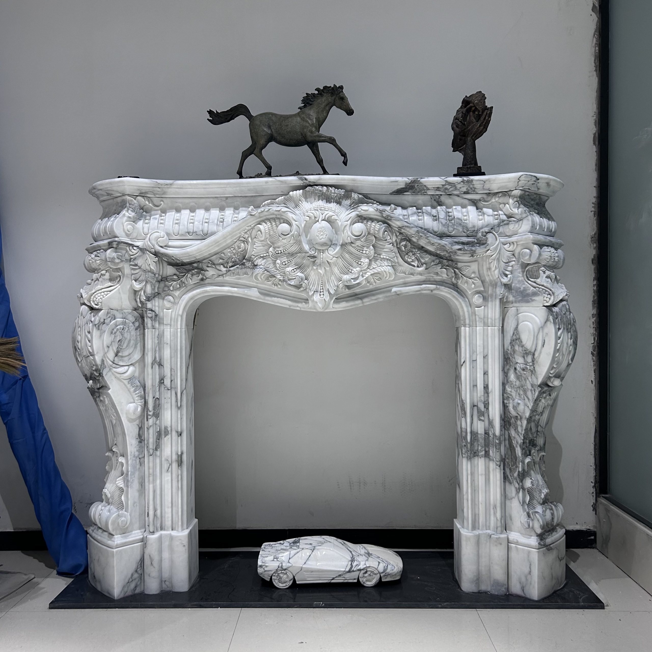 Elegance Unveiled: Exquisite Fireplace Sculpture