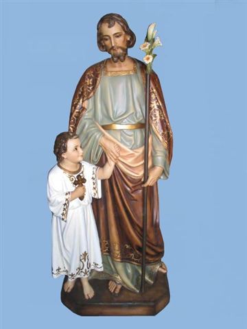 statue of a man holding a staff with a child beside him
