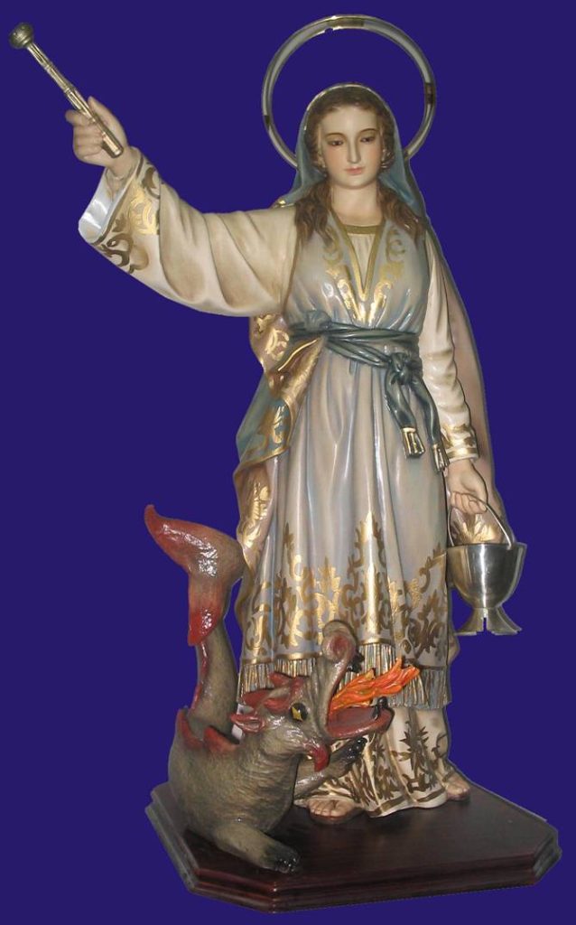 figurative sculpture of a saint with a dragon