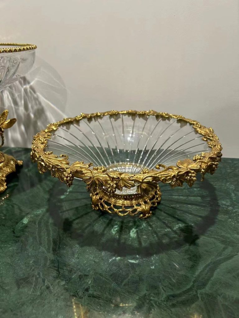 ornate glass bowl with gold leaf detailing