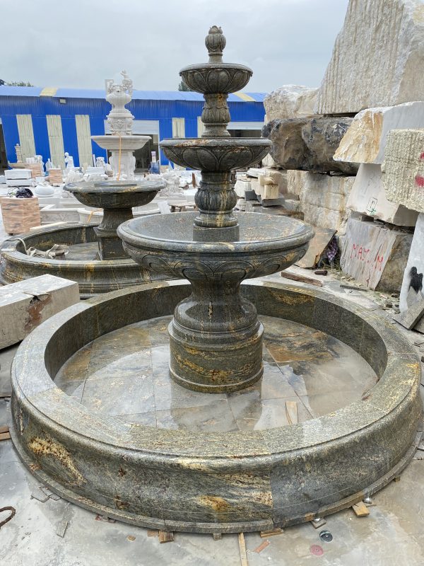 Elegance in Motion: Timeless Fountain Sculpture