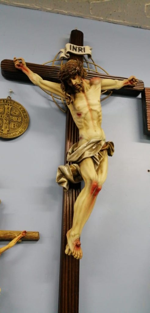 detailed crucifix sculpture with Christ on the cross