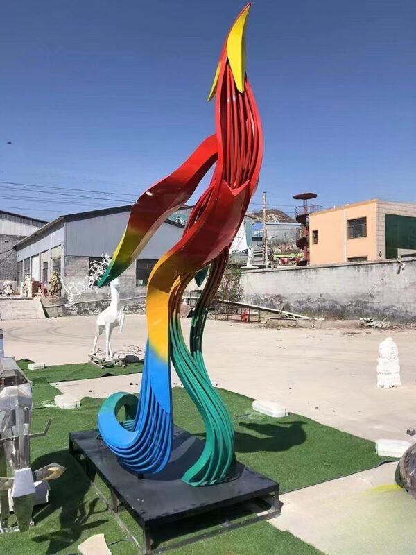 colorful abstract sculpture resembling flowing waves or flames