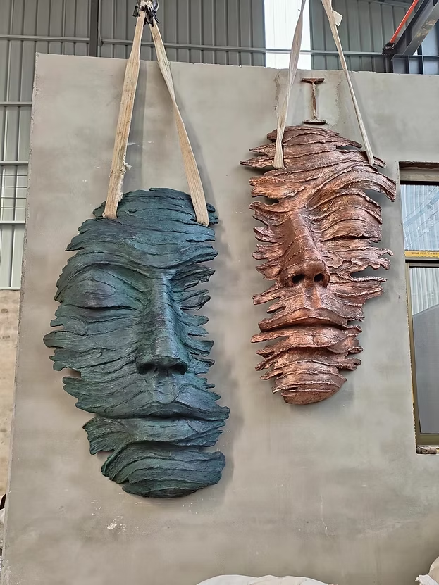 Hanging Faces: A Captivating Human Figure Sculpture
