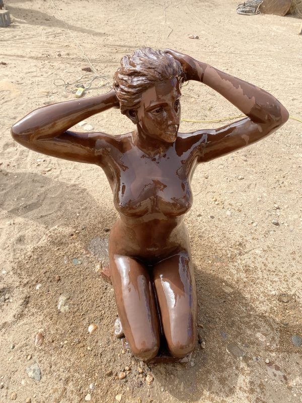 Kneeling Nude: A Study in Poise and Elegance