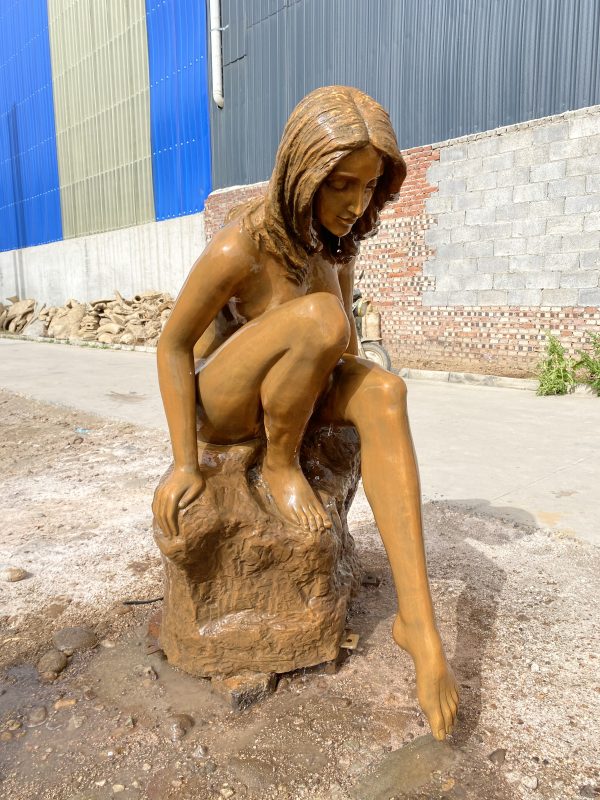 Elegant Lady Sitting Sculpture