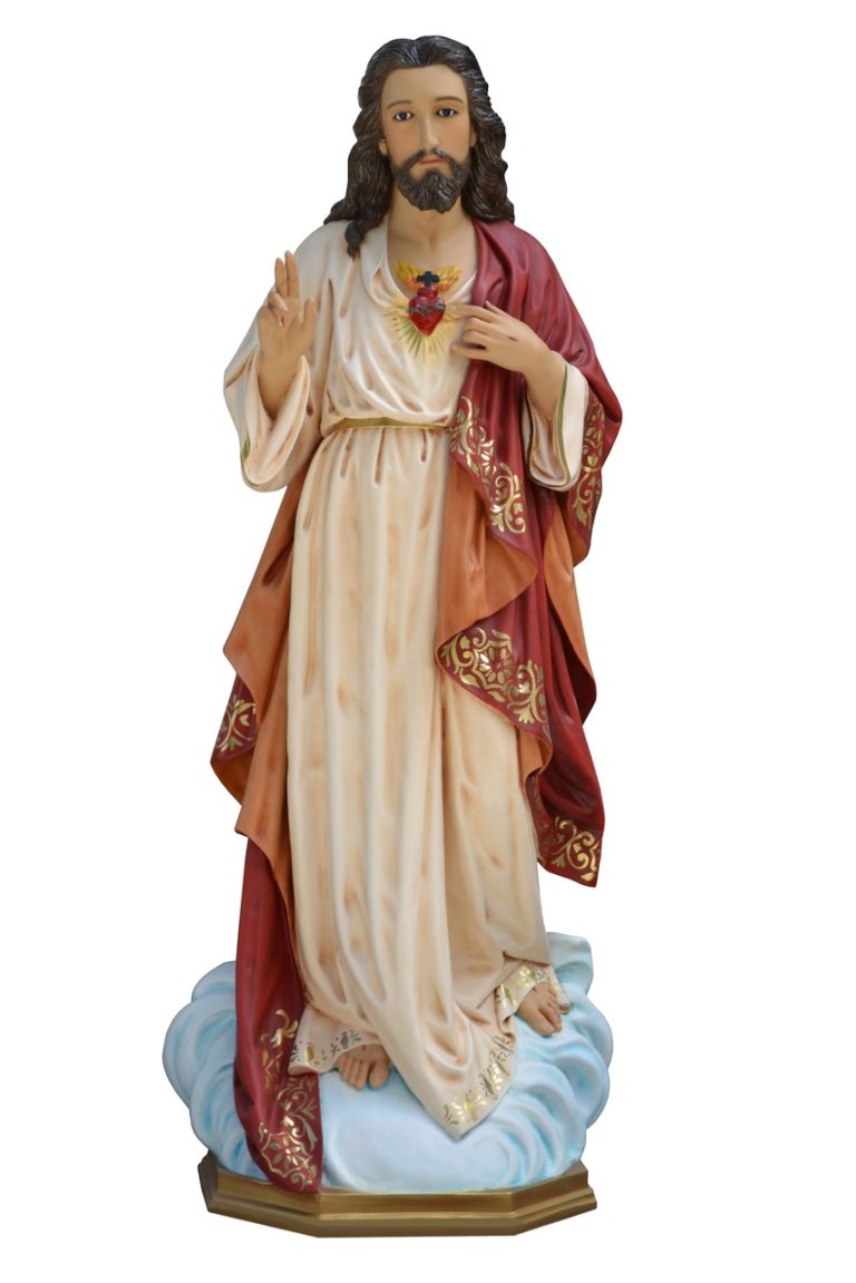 religious sculpture of Jesus with a heart, standing on clouds