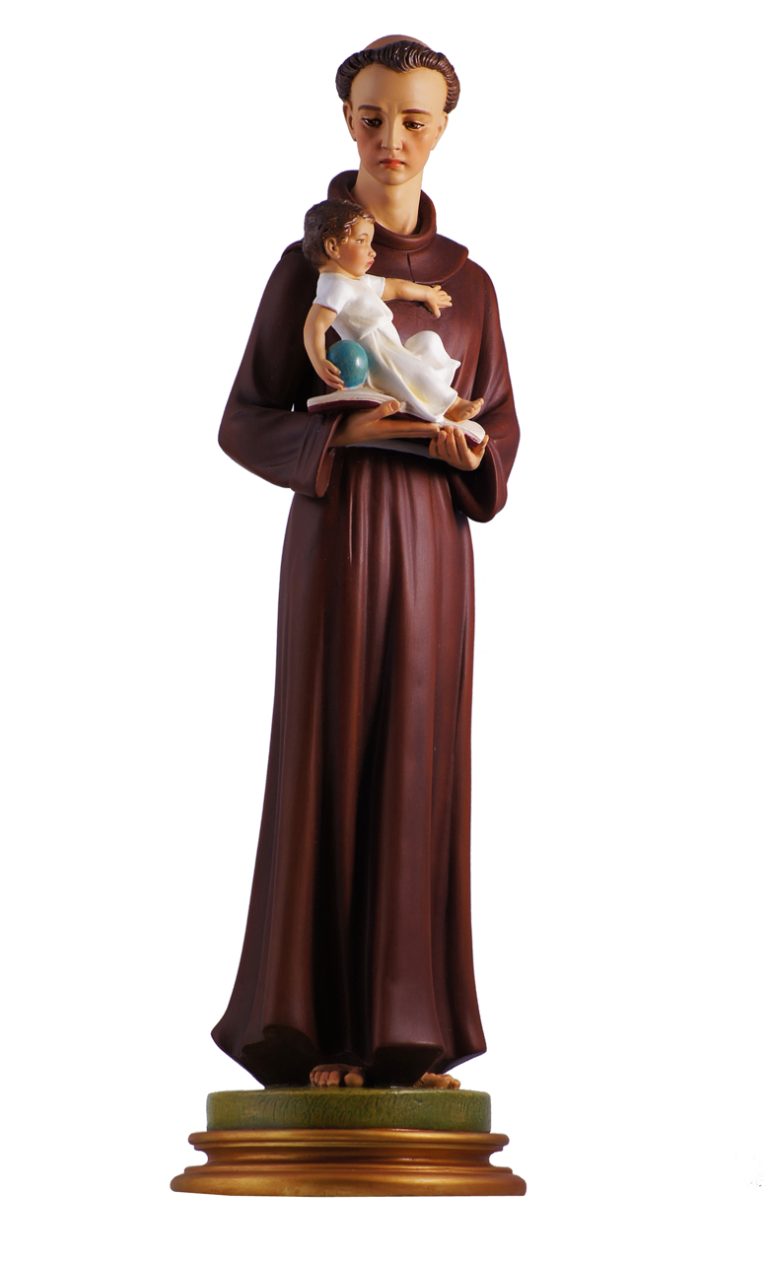 statue of a saint holding a child in a robe