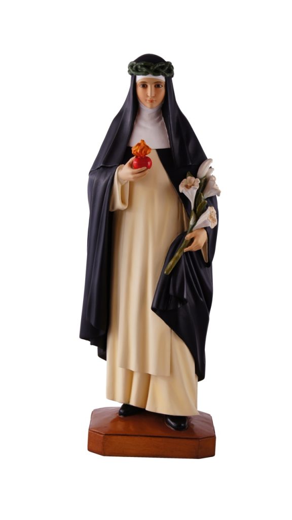 figurine of a woman holding flowers and a fruit