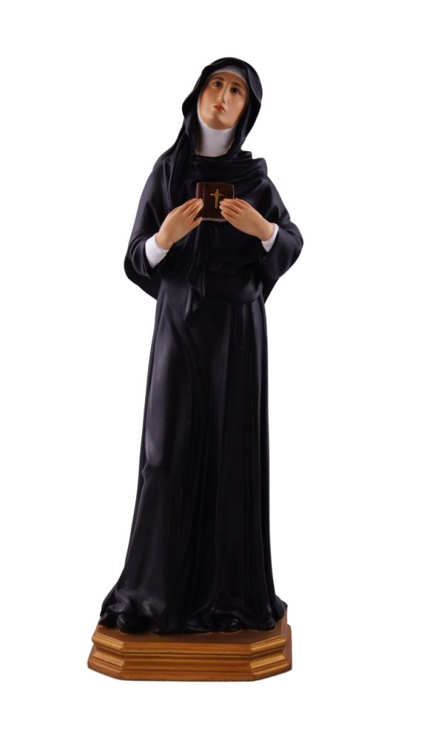 figurative sculpture of a nun holding a cross