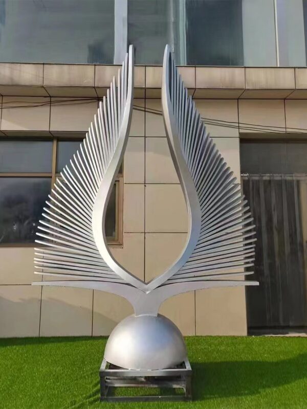 Abstract sculpture resembling fish fins in a modern design