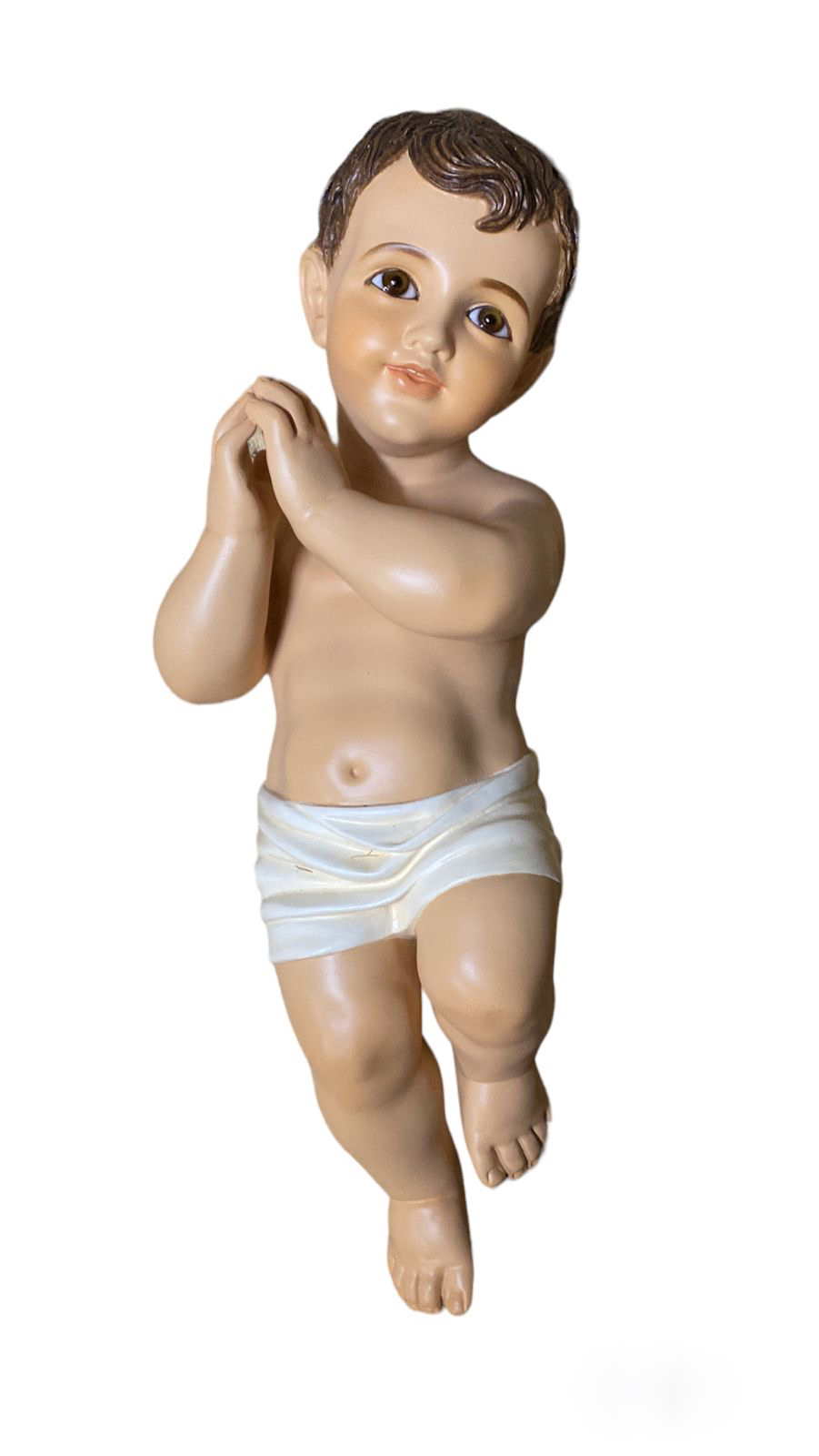 a porcelain figurine of a cherubic child in a playful pose