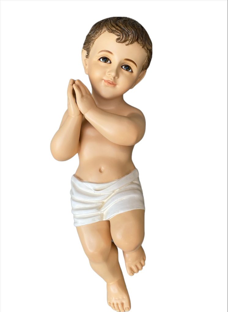 figurine of a young child with clasped hands