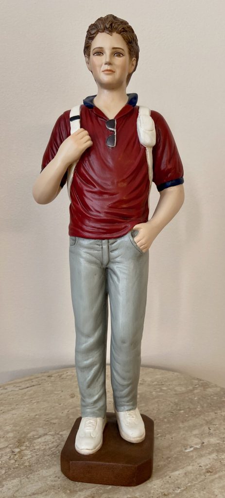 young male figure in casual attire with backpack