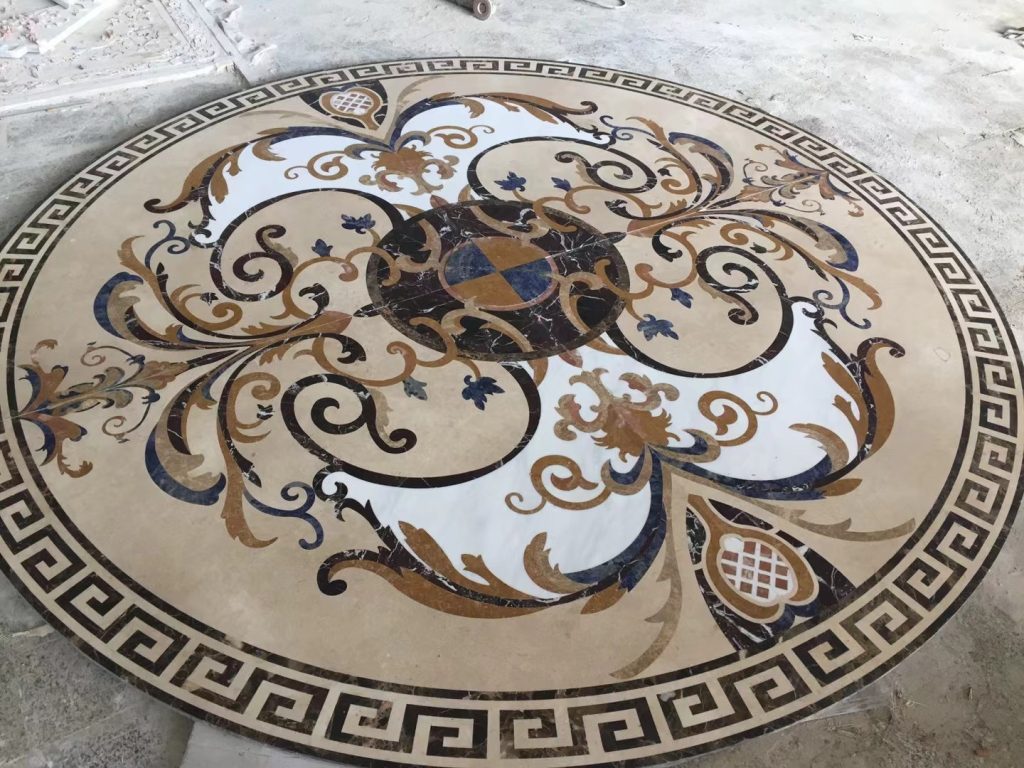 intricate circular marble mosaic with floral patterns