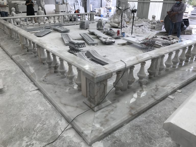 marble sculpture workshop with unfinished balustrade and tools