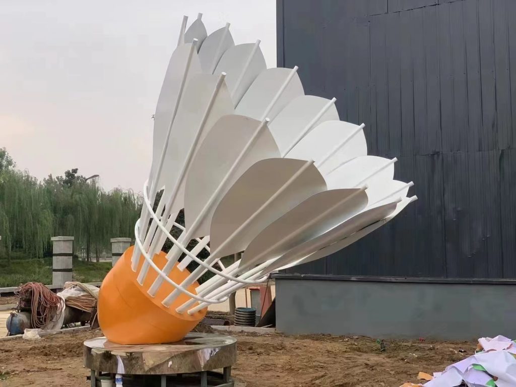 large artistic sculpture resembling a shuttlecock in outdoor setting