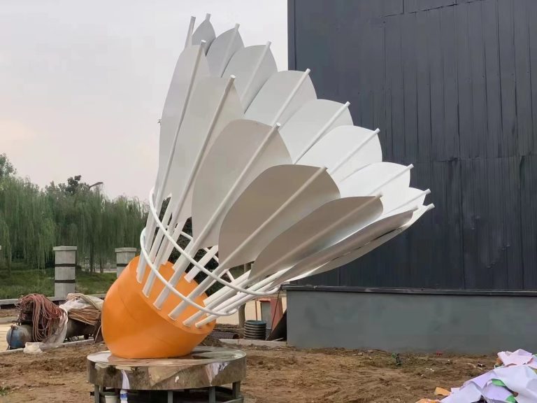 large artistic sculpture resembling a shuttlecock in outdoor setting